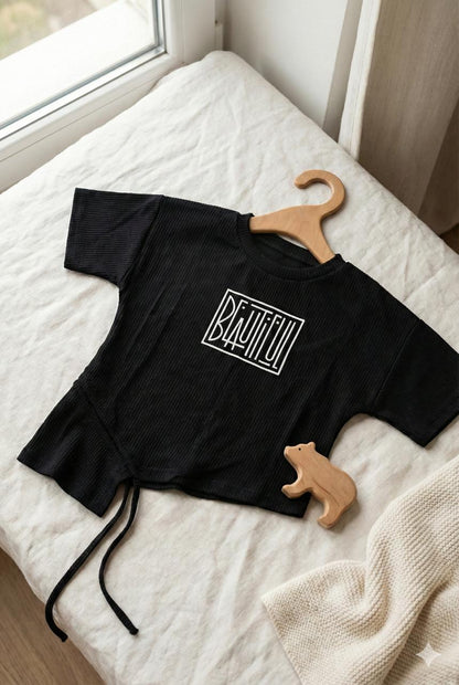 Black Ribbed Asymmetrical Tie-Up Top with “Beautiful” Print